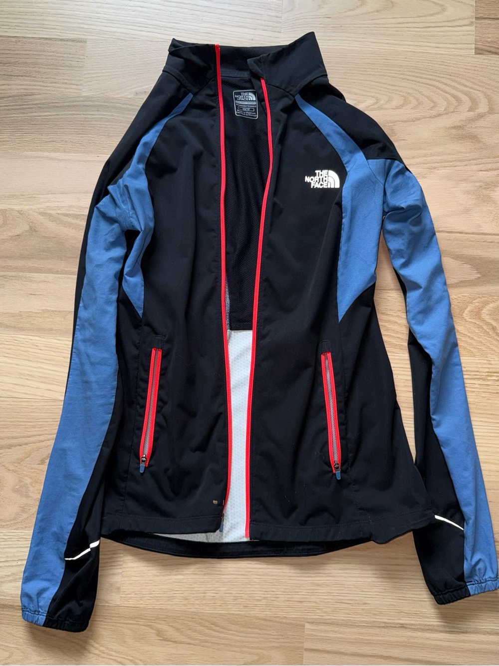 The North Face Women's Black Lightweight Jacket with Blue Panels & Red Trim - XS